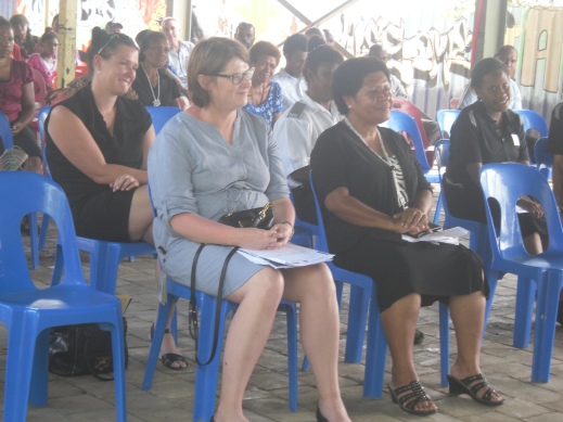 Ms. Joanne Ronalds DFAT Representative and APNG Director Mrs. Heni Meke attentive to the program speakers during the Child Protection Launch. Nov. 2014
