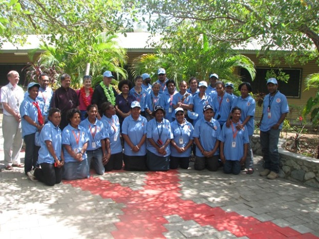 Staff of Anglicare PNG POM Branch pose for a group photo with Anglican Arch Bishop of Canterbury Justin Welby. August 9 2014. He spoke highly of the service provision in addressing gender sensitive issues in an equal manner. 