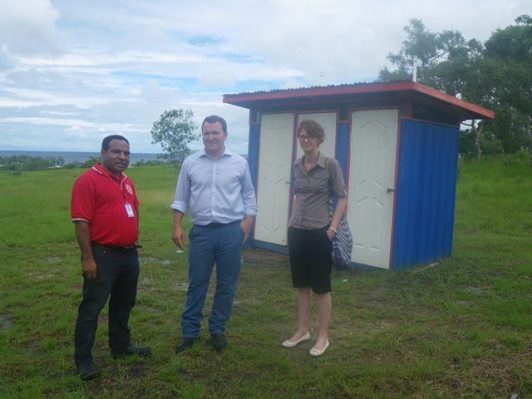 Representatives from the Office of Development Effectiveness of the Australian Department of Foreign Affairs and Trade (DFAT) Ben Ward and Tracey McMartin taken on a tour of the APNG WASH project site by the new Project Officer for the Anglicare POM WASH Team Mr. Thomas Gunn, March 2015, Central Province, PNG PAPA School