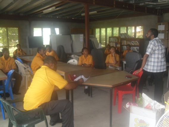 Mr. Bernard Paru, Anglicare POM Branch Manager speaking to students of the Port Moresby National High Grade 11 students who paid a humanitarian visit to Anglicare POM Branch to donate some gifts for the Friends at the Drop In Centre 2014